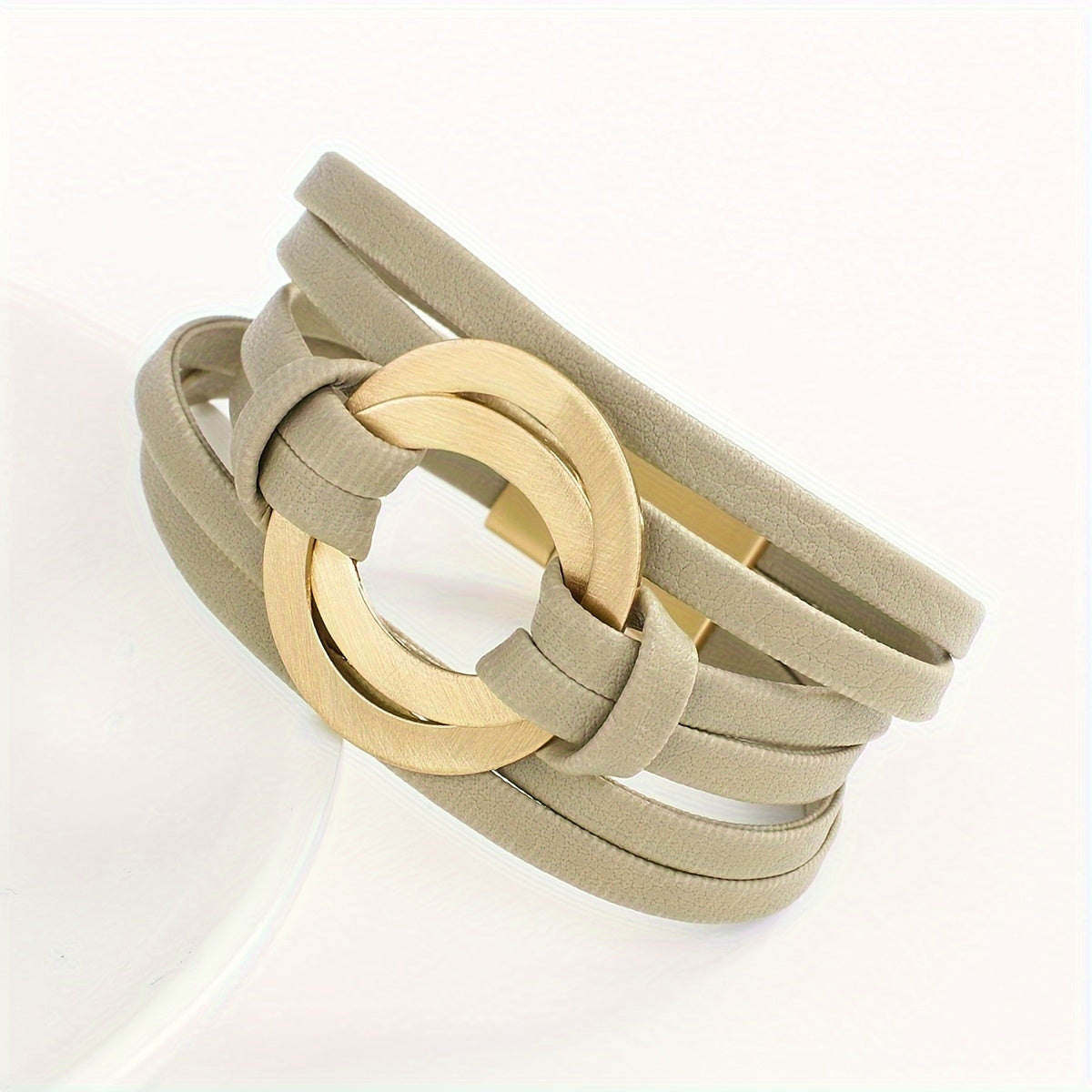 Artificial leather bracelet for women with double circle charm and magnet buckle clasp - a stylish wide bangle bracelet that makes a great gift.