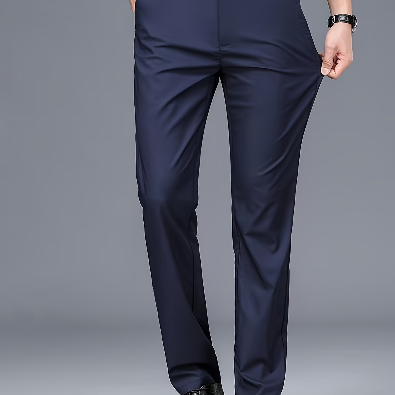 This is a versatile pair of men's straight-leg suit pants suitable for both professional or casual wear during autumn and winter.