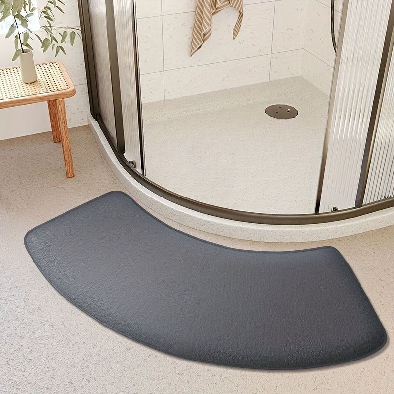 This non-slip bath mat is made of thickened polyester and designed for use as a shower door rug or entryway foot mat. It can be hand-washed and has a low pile, making it easy to clean. This machine-made mat weighs 660g per square meter and is 1.2cm