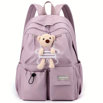 Purple women's casual nylon backpack with laptop compartment, adjustable strap and tassel detail. Features polyester lining, zipper closure, and fashionable shoulder bag design for going