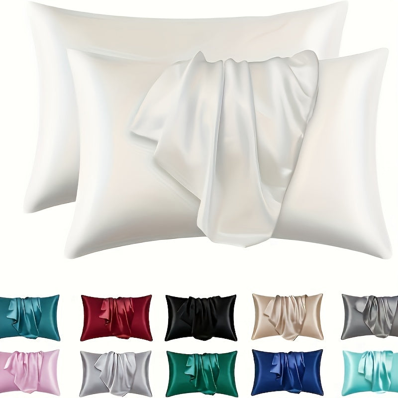 Two luxurious silky soft pillowcases with breathable and skin-friendly cooling feel. Solid color with envelope closure. Machine washable. Set of two.