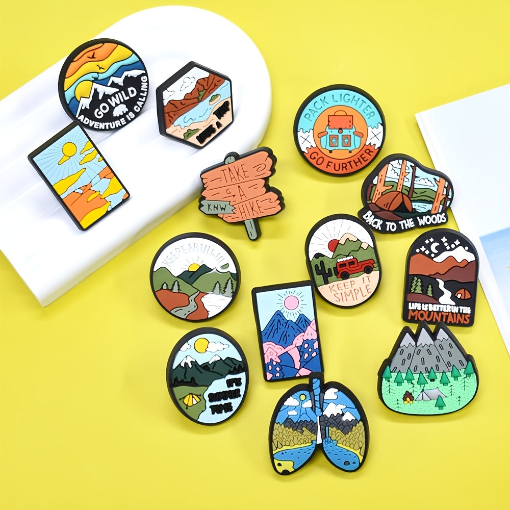 A set of 16 adventure-themed plastic brooch pins featuring travel and nature inspired designs such as trees, rivers, mountains, sun, car, and tent motifs. Perfect for backpack accessories, this holiday gift pin set is sure to inspire any nature lover.