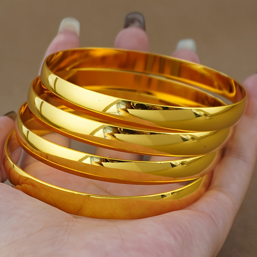 Set of 4 beautiful bangles plated with elegant 24K golden copper, featuring a cute Boho style perfect for daily wear or parties. These versatile accessories are ideal for carnival celebrations and year-round fashion statement pieces.