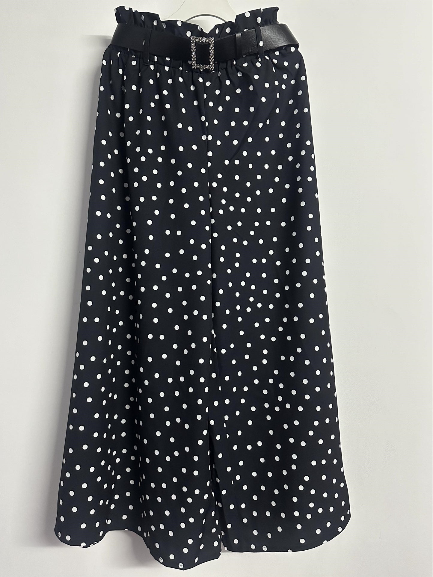 Elegant polka dot wide-leg pants for women made of non-stretch polyester with belt detail, machine washable.