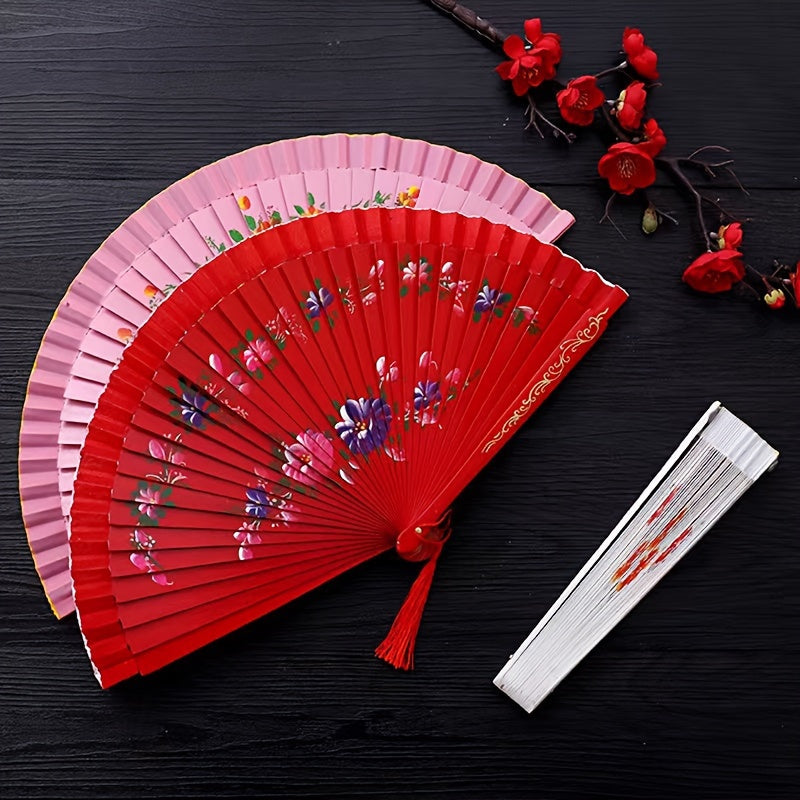 Wooden Spanish folding fan for dancing and home decoration with printed design, conveniently folds for easy storage.