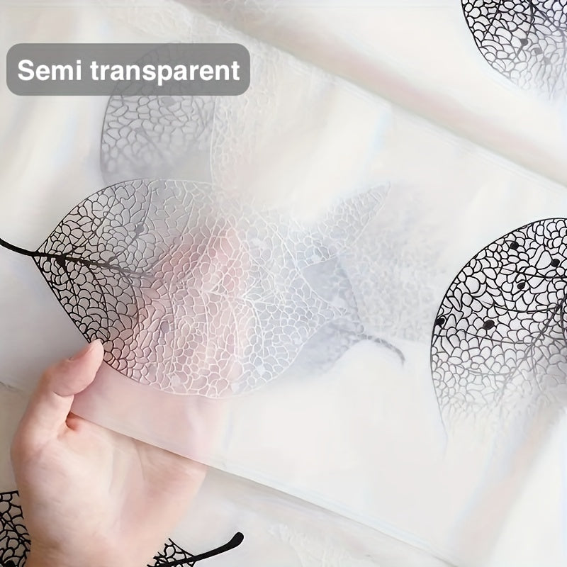 Waterproof PEVA shower curtain liner with leaf pattern and plastic hooks, suitable for various settings such as hotels, apartments, dormitories, and homes for bathroom and window decoration.