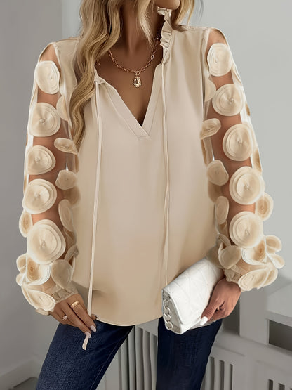 Women's round embellished mesh pullover top with notched collar, lantern sleeve, and contrast mesh details. Perfect for a night out or vacation. Made of solid color polyester with a regular