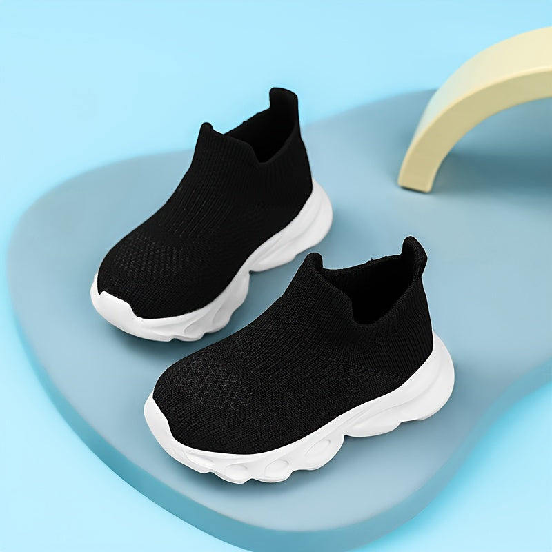 Kids' slip-on sneakers with breathable knit material, EVA sole, and low-top design. Perfect for daily wear, outdoor activities, and all seasons. Cute and comfortable footwear for boys and