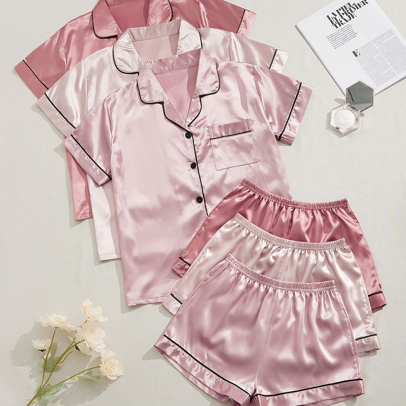 Women's Satin Pajama Set includes short-sleeve top and elastic waistband shorts for sleepwear and loungewear.