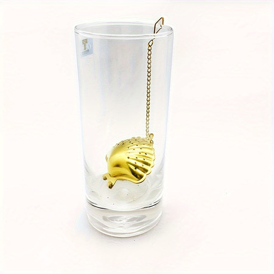 Tea strainer made of stainless steel, with a shell shape design, for filtering tea grounds