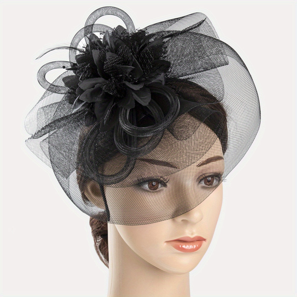 One piece of women's hair accessory featuring a mesh flower, faux feather detailing, and veil perfect for birthday parties, the Jockey Club, weddings, derby hats, and church events.