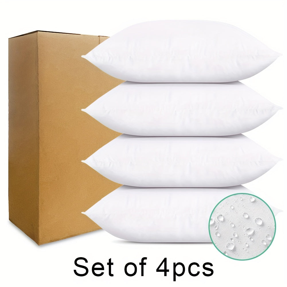 1 box of 4 waterproof outdoor throw pillow cores, white with zipper, perfect for courtyard or indoor use.