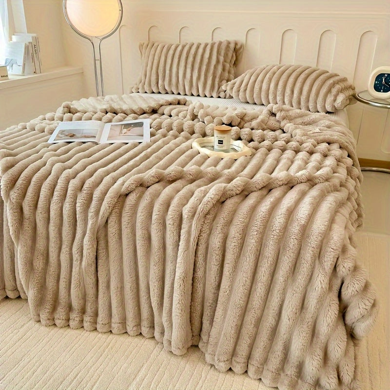 Stay cozy and stylish with our luxurious 1pc Contemporary Champagne Plush Double-Layer Throw Blanket. Made of 100% polyester and weighing 250-300gsm, this blanket is perfect for all seasons. It is machine washable and incredibly soft and warm, making it