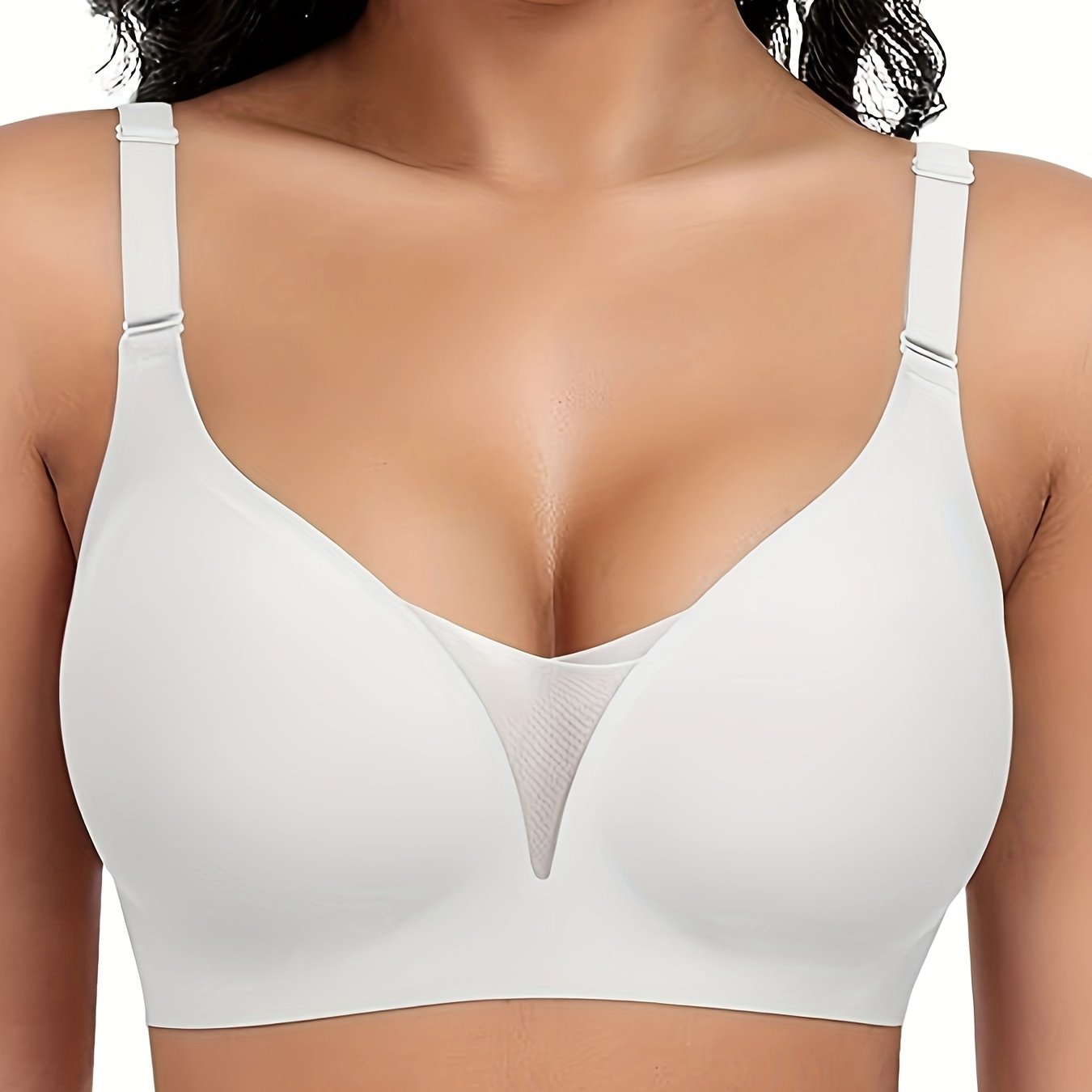 Wireless sports bra for women with seamless design for comfort and support, enhanced by lace and mesh details.