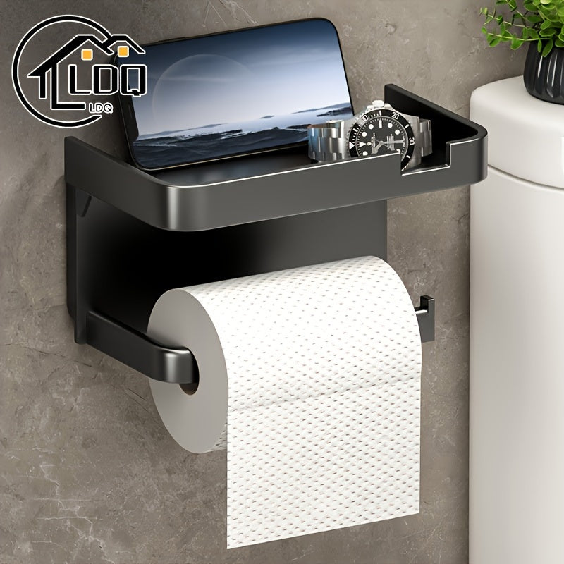 Self-adhesive toilet tissue holder with drawer for tissue and phone storage.