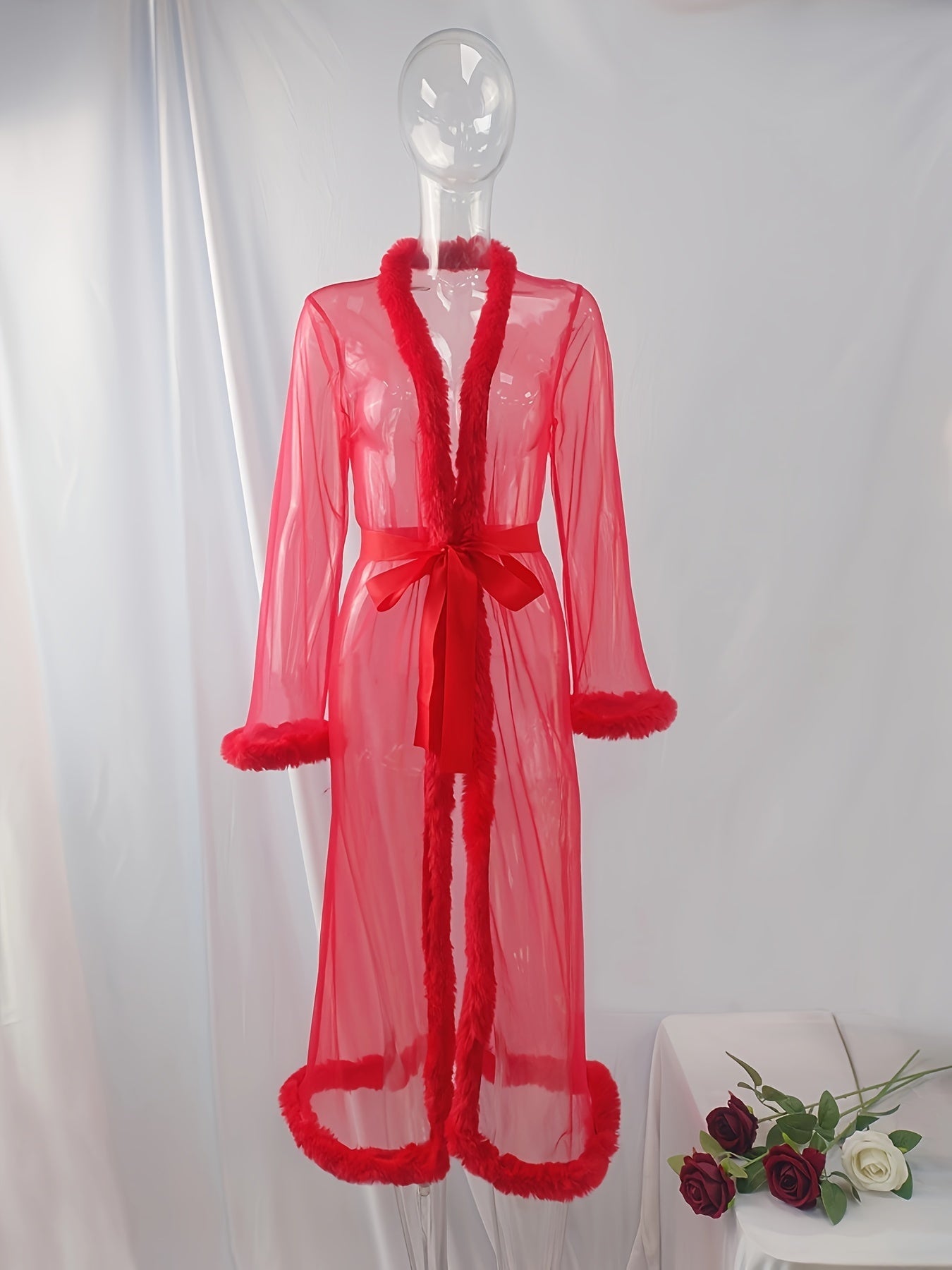 Women's sheer mesh robe with lace-up detail, made of 95% knit polyester and 5% elastane. Perfect for mature style sleepwear in the autumn/winter season.