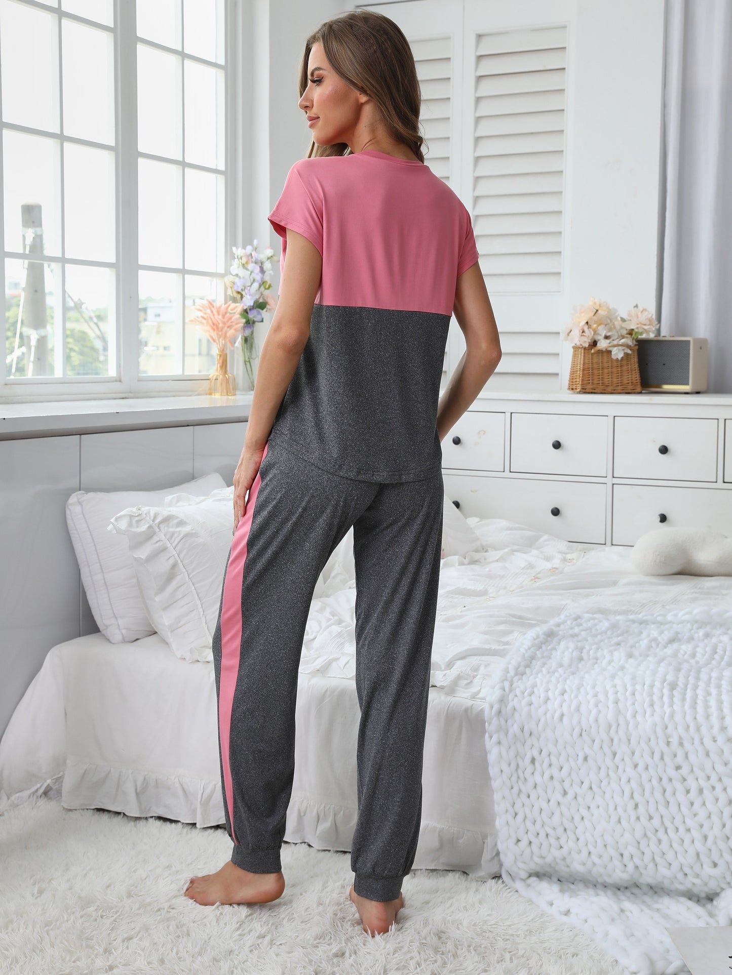 Colorblock letter print pajama set for women with short sleeve top and long pants, round neck design, stretchy polyester blend material, machine washable.