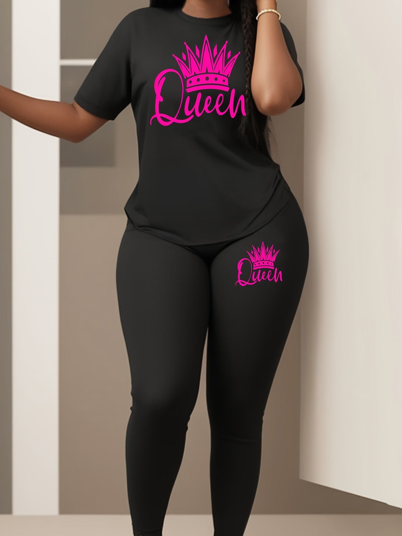 Women's activewear set with a queen crown graphic, stretchy polyester blend, machine washable, crew neck tee and long pants.