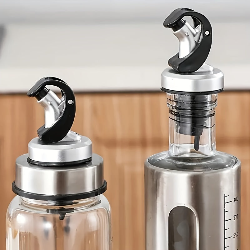 2 reusable vinegar bottle stoppers with automatic opening/closing, spill-proof, dust-resistant design. Ideal for restaurants, homes, and commercial use.