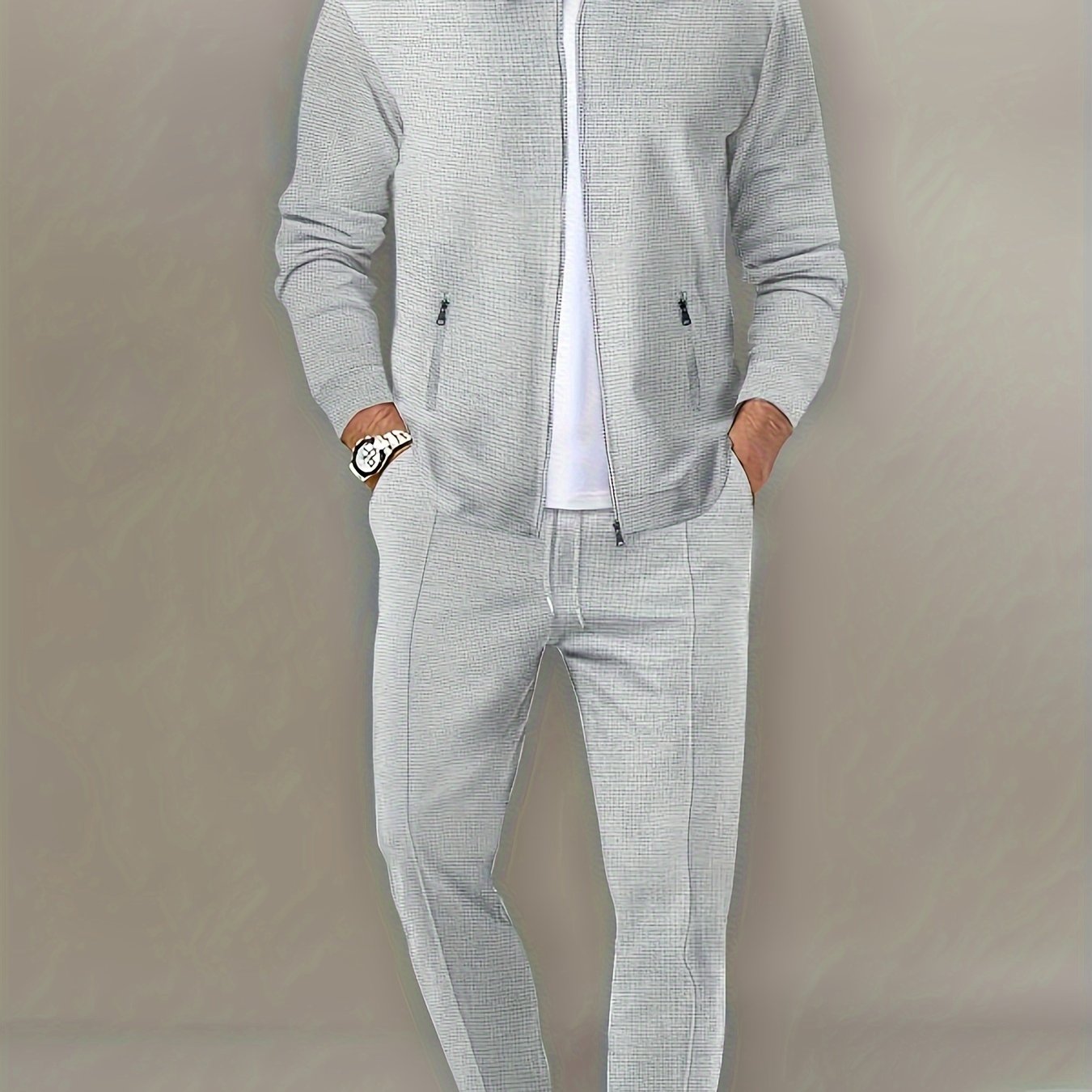 Men's beige waffle knit tracksuit set. Includes full-zip jacket and jogging pants. Made from polyester/spandex blend, machine washable. Perfect for gym and outdoor activities.