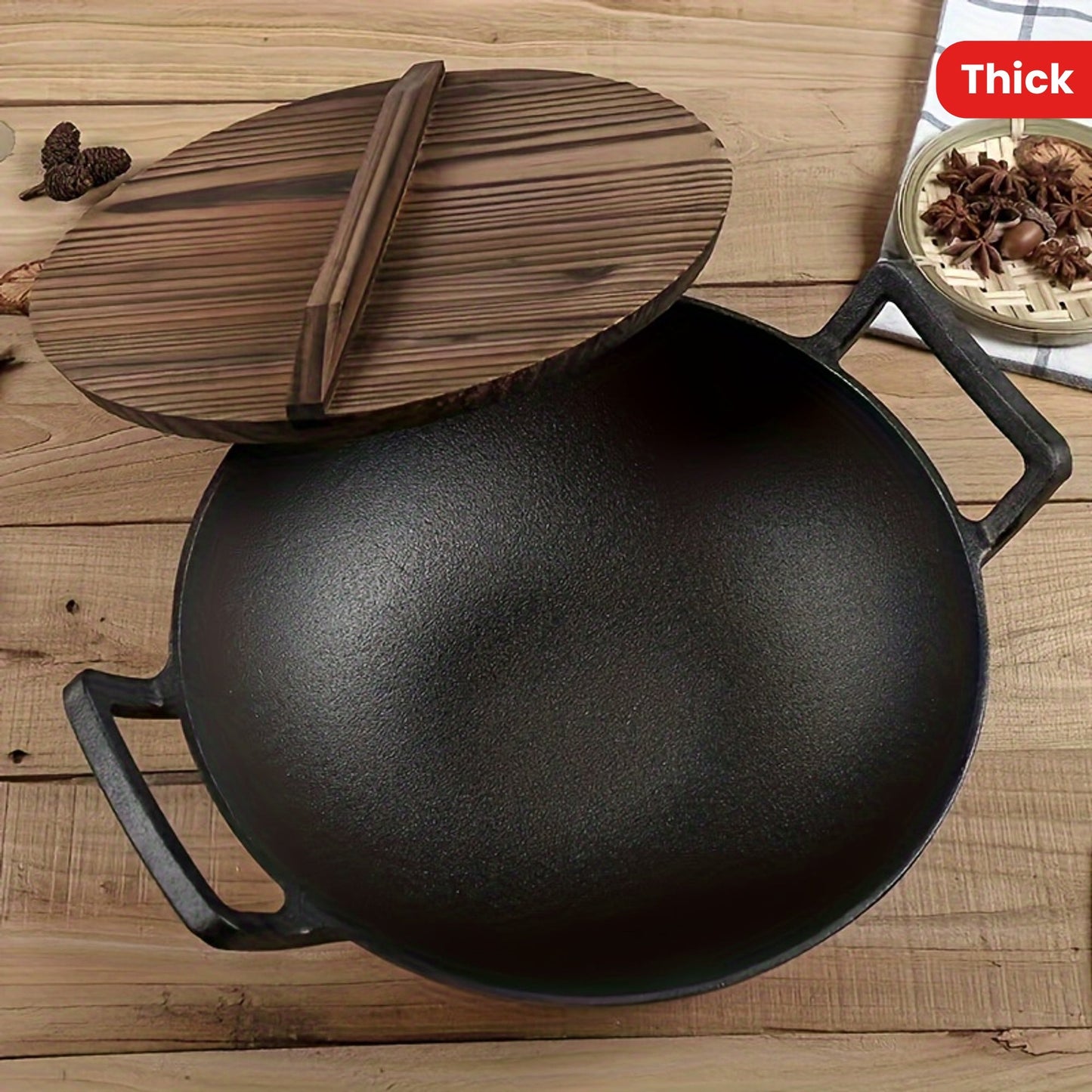 This large cast iron wok is perfect for home use, with double handles and a thickened, uncoated surface. It is compatible with electric stoves and gas ranges, and features a vintage style design. The wok also comes with a pine wood lid, making it a