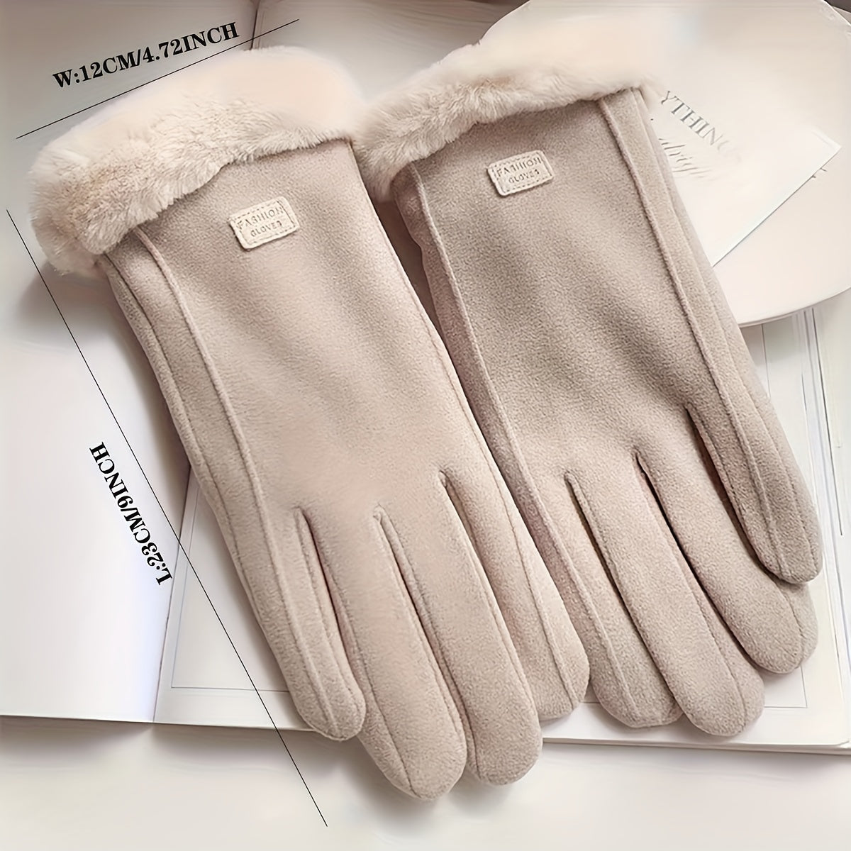 Warm and comfy beige touchscreen gloves for women with a plush lining to keep hands cozy in the winter featuring a full finger design.