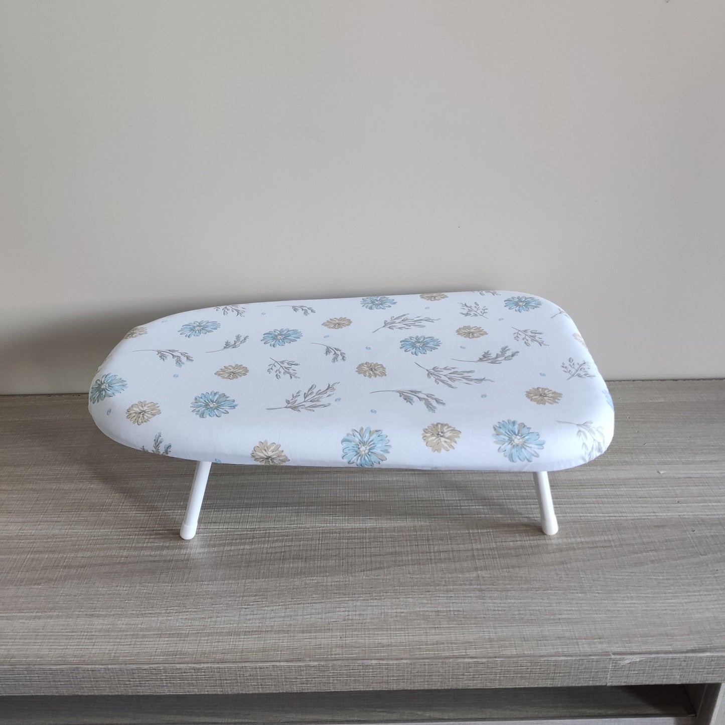 Compact Floral Design Ironing Board, Foldable Tabletop Clothes Pressing Pad, Sturdy Plastic Material, Secure Base, Convenient Space-Saving Option