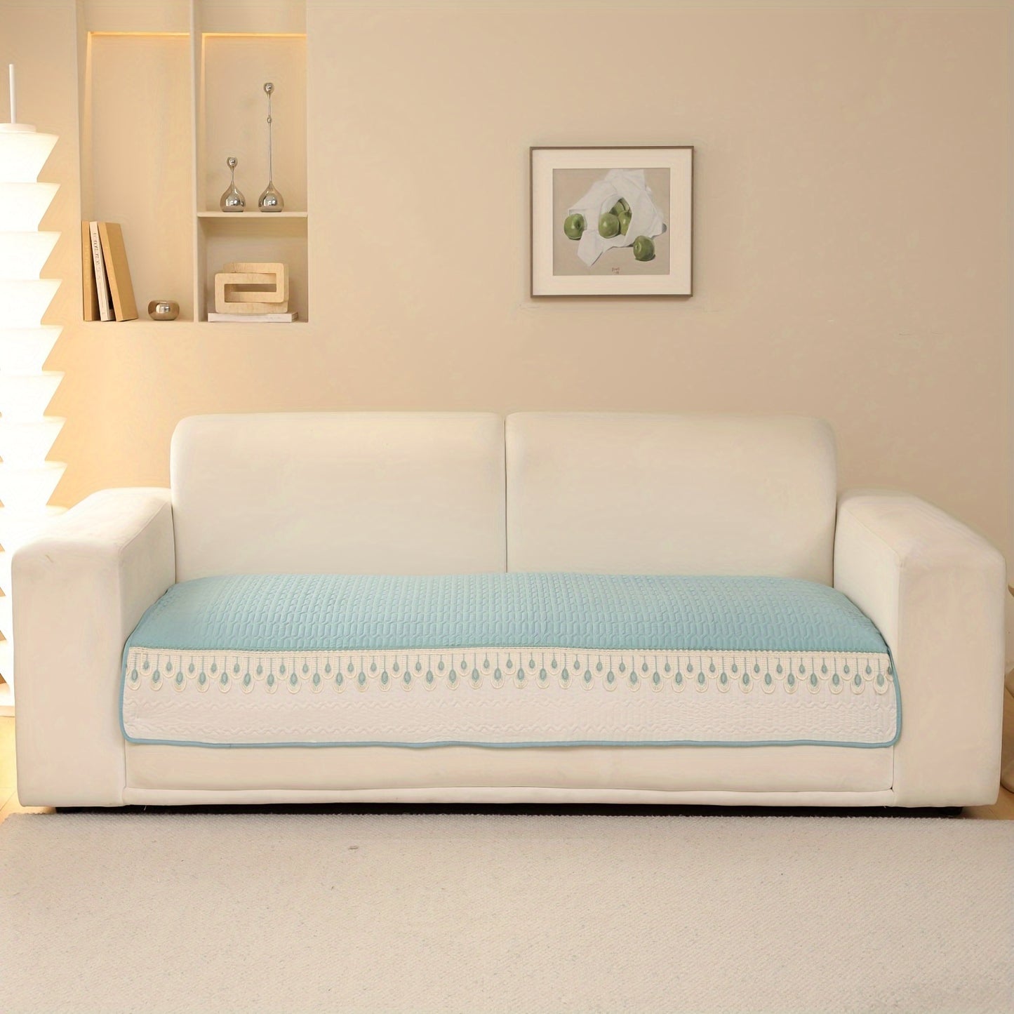 Luxurious Feather Embroidery Quilted Sofa Cover enhances and protects your couch.