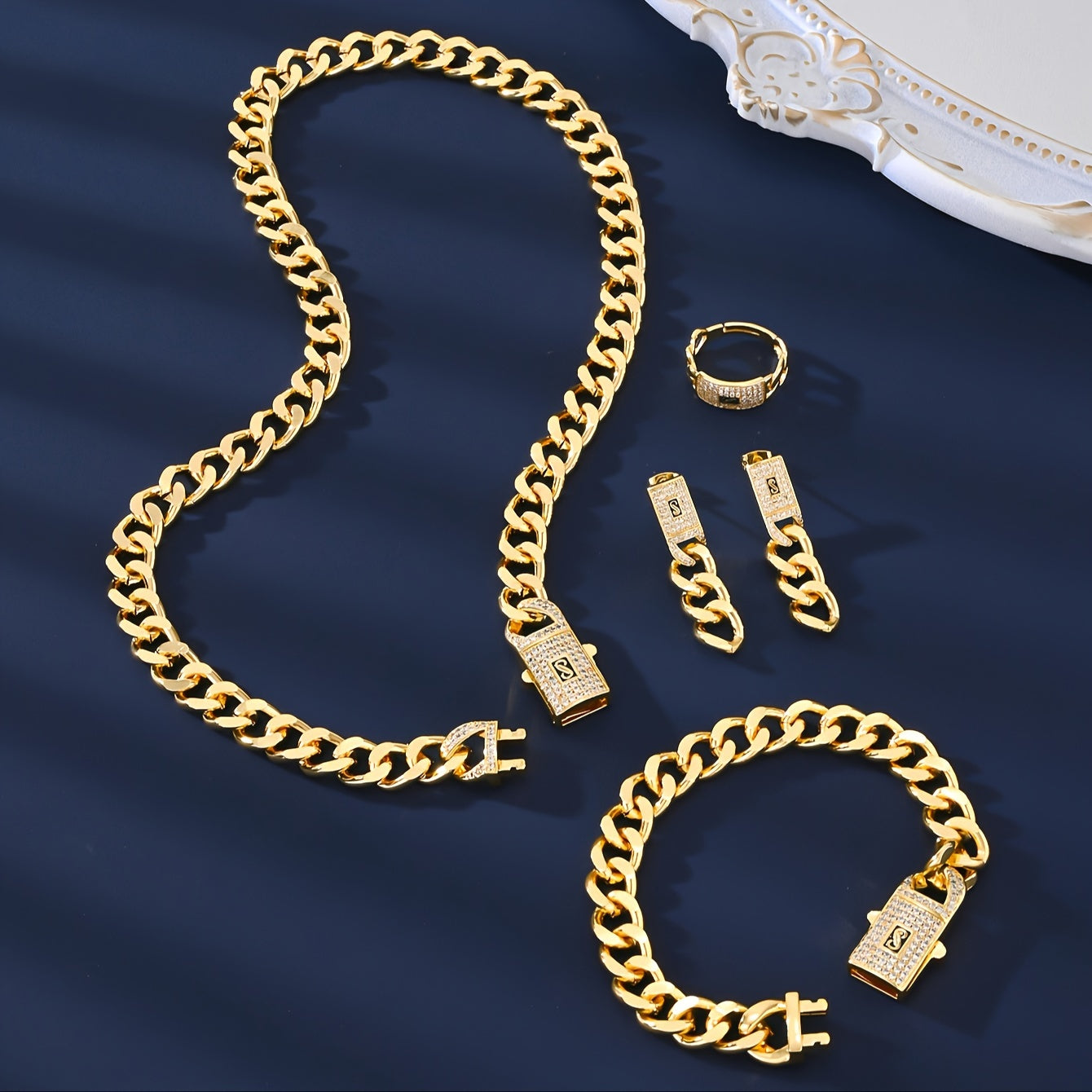 Classy and versatile high-quality copper jewelry set for European and American women, including necklace, earrings, rings, bracelets, and zirconia lock. Perfect for everyday wear, adding elegance and style to any outfit.