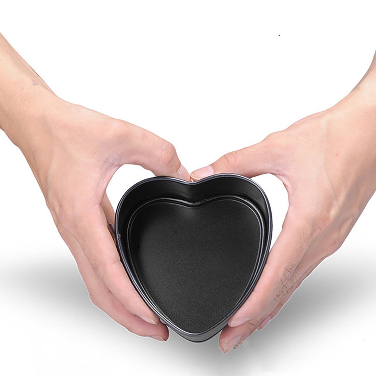 Heart-shaped detachable bottom baking pan, measuring 10.49cm, perfect for making cheesecakes, fried eggs, pudding molds, cake tiers, wedding cakes, and more. This nonstick springform pan features a removable bottom for easy release and is leakproof. It