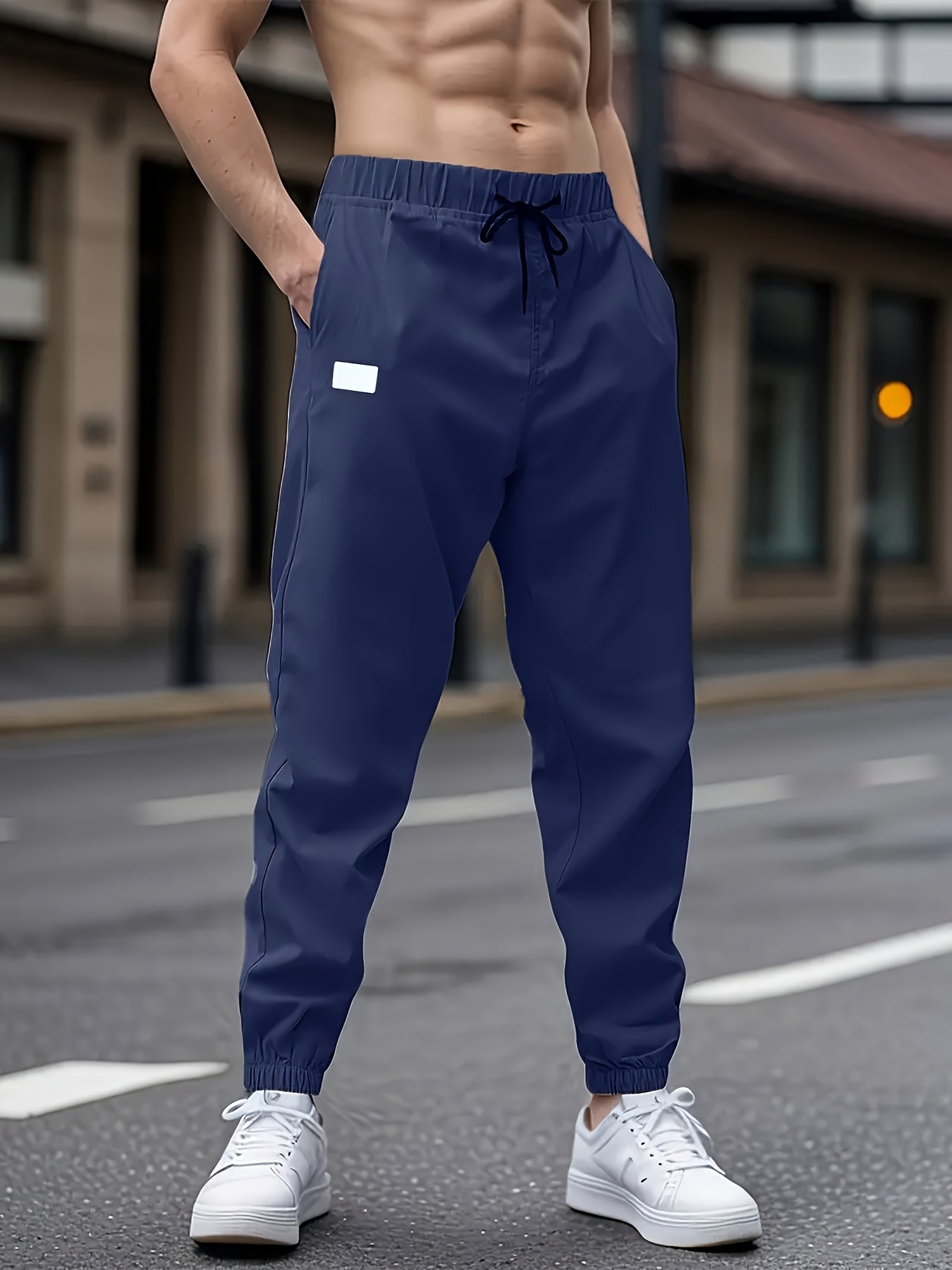 Men's casual cargo pants with drawstring waist, non-stretch polyester fabric, regular fit, lined with polyester, ideal for weekend wear.