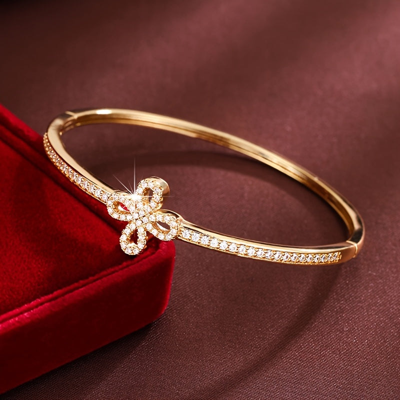 An exquisitely crafted bracelet designed for women, showcasing a delicate fireworks design adorned with synthetic zirconia.