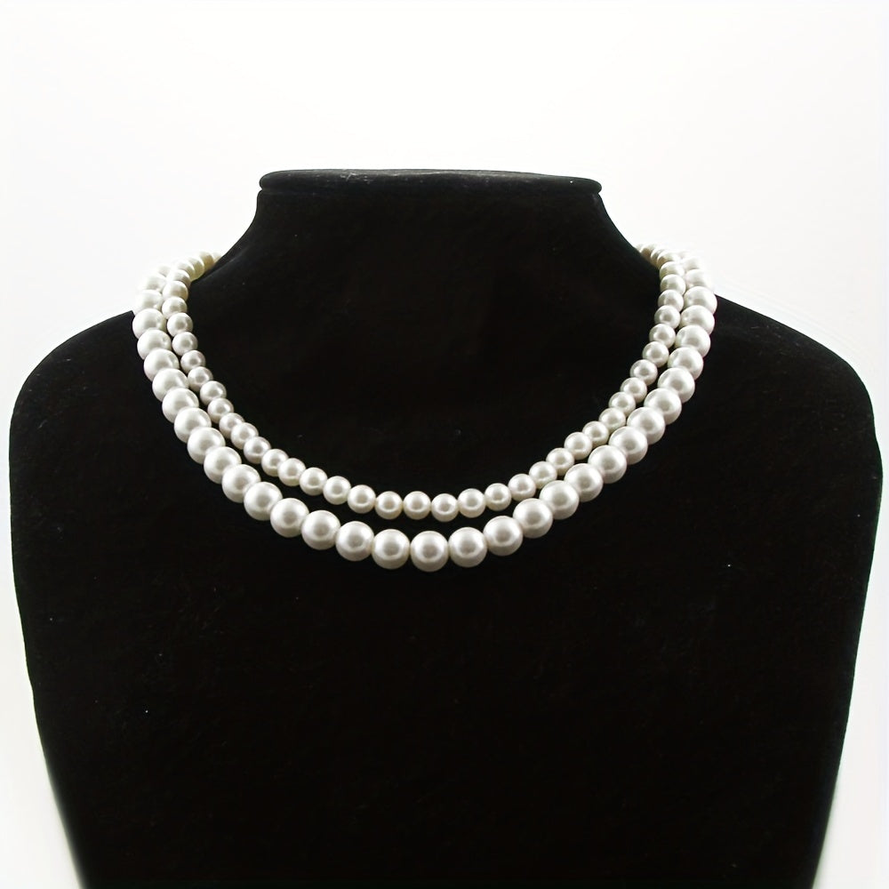 Indulge in Elegance with the JASTAR Double Strand Shell Pearl Necklace featuring 6mm and 8mm pearls, adorned with an Infinite Clasp and full zirconia inlay. Elevate your style with this luxurious fashion statement perfect for women, and with its