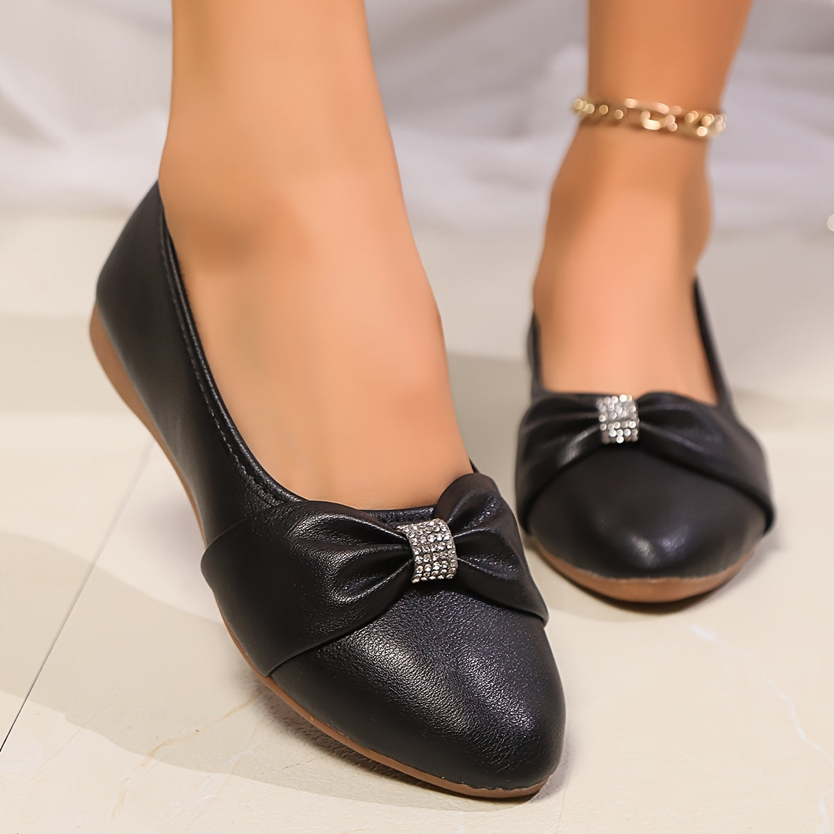 Women's flat shoes with bowknot and rhinestone decoration, pointed toe, soft sole, slip on style.