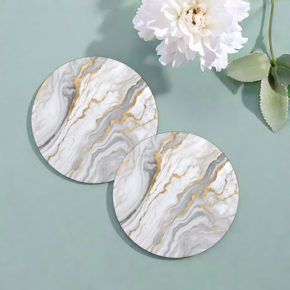 6 golden marbled coasters with absorbent rubber and non-slip backing, perfect for home decor or as a housewarming gift, each 10.16 cm in diameter.