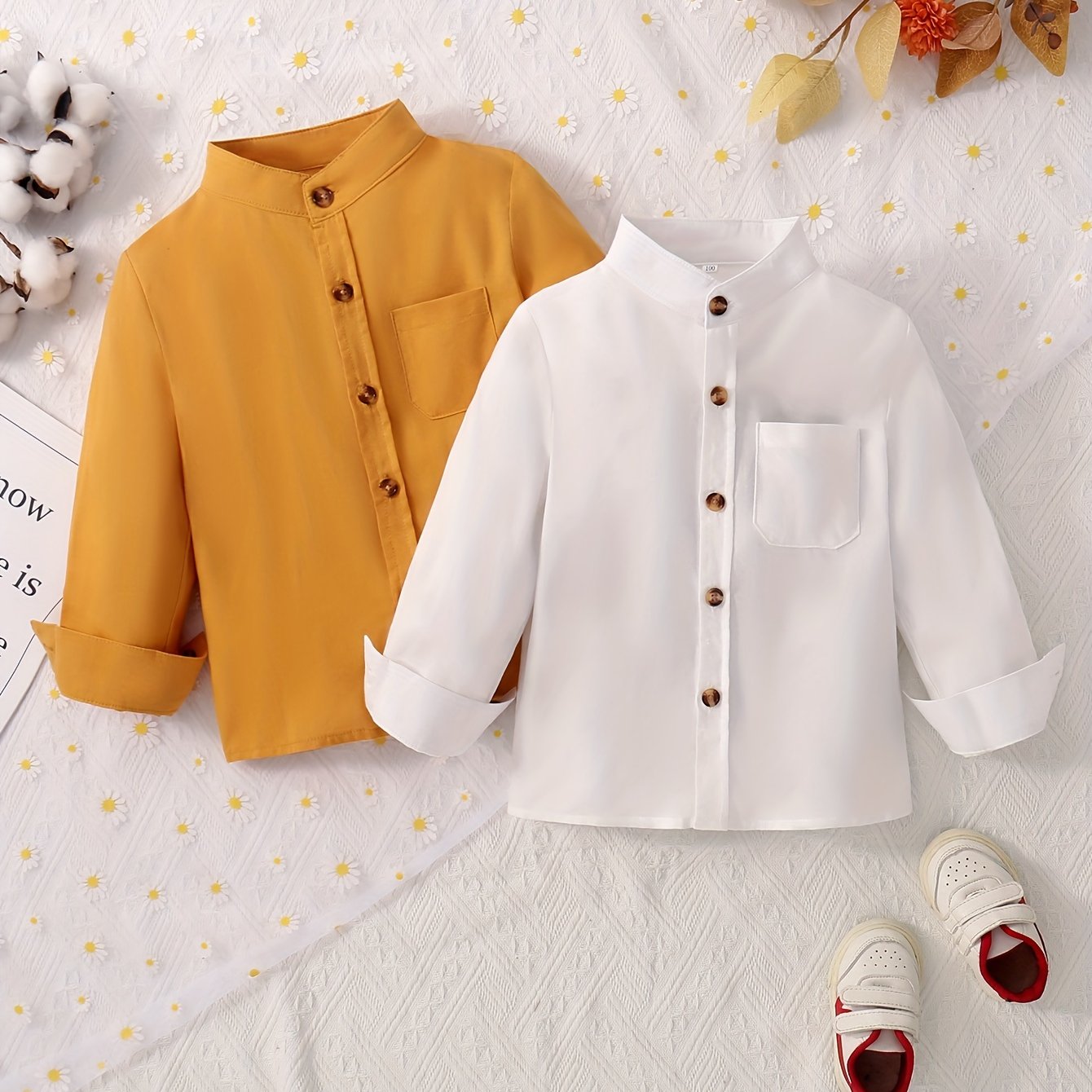 2 boys solid color stand collar shirts with long sleeves and button-up design, suitable for spring and fall wear.