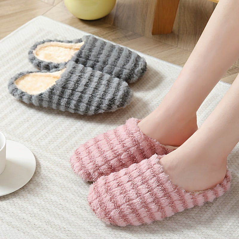 Women's striped print plush house slippers with anti-slip sole for indoor use.