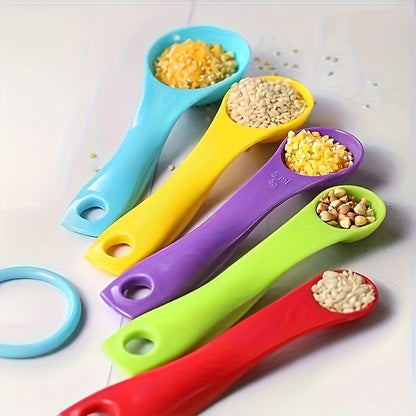 1 measuring cup and 5 measuring spoons with stackable handles, ideal for precise baking and cooking measurements.