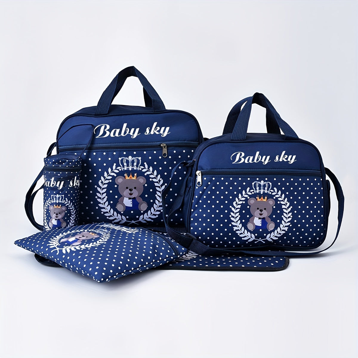 Five-piece set of fashionable bear-printed mommy bags with large capacity, featuring a multifunctional design for carrying as a one-shoulder messenger bag or diaper bag.