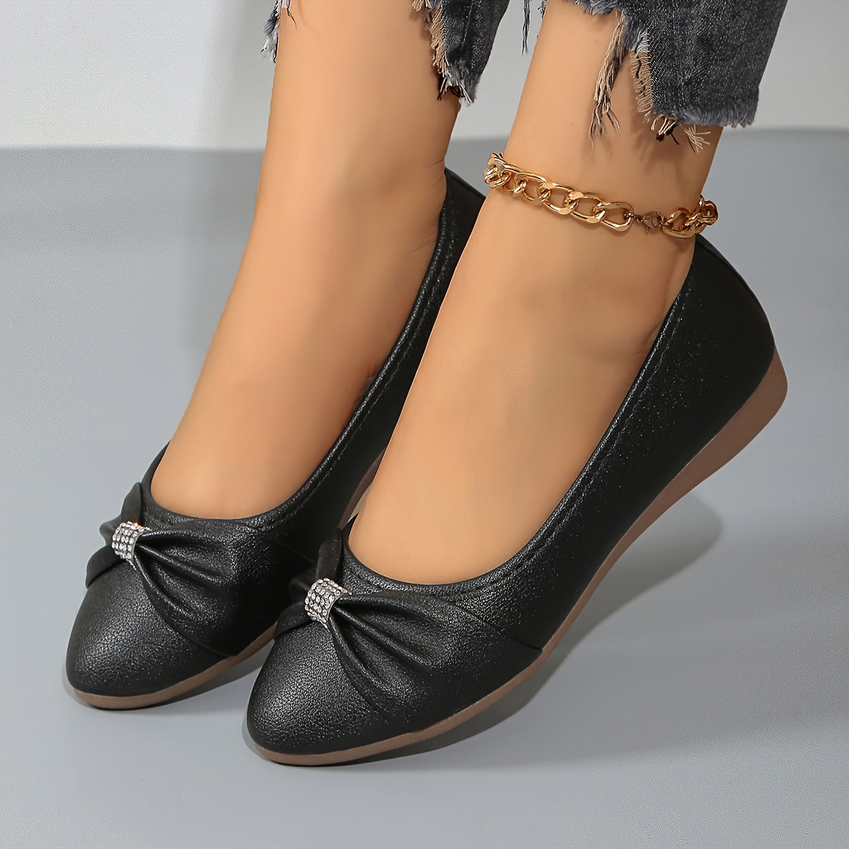 Women's flat shoes with bowknot and rhinestone decoration, pointed toe, soft sole, slip on style.