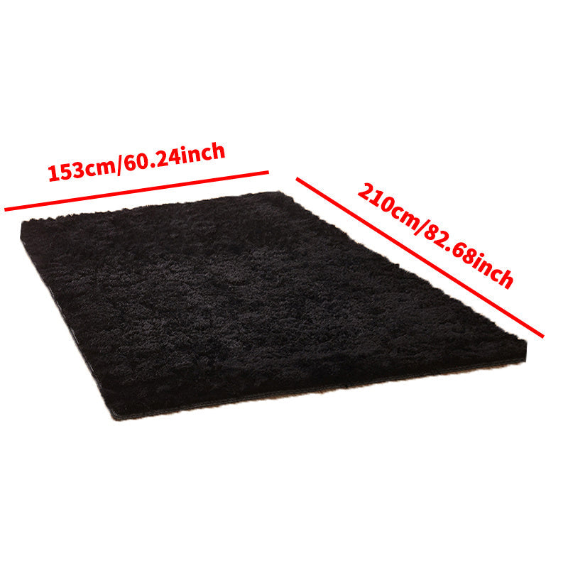 1 piece of Fluffy Black Shag Area Rug, made with extra soft and shaggy materials. Perfect for adding a cozy touch to your bedroom, living room, or outdoor space. Great for home decor.