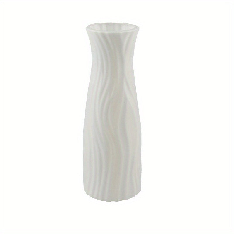 Plastic vase with ceramic look for home or office decor.