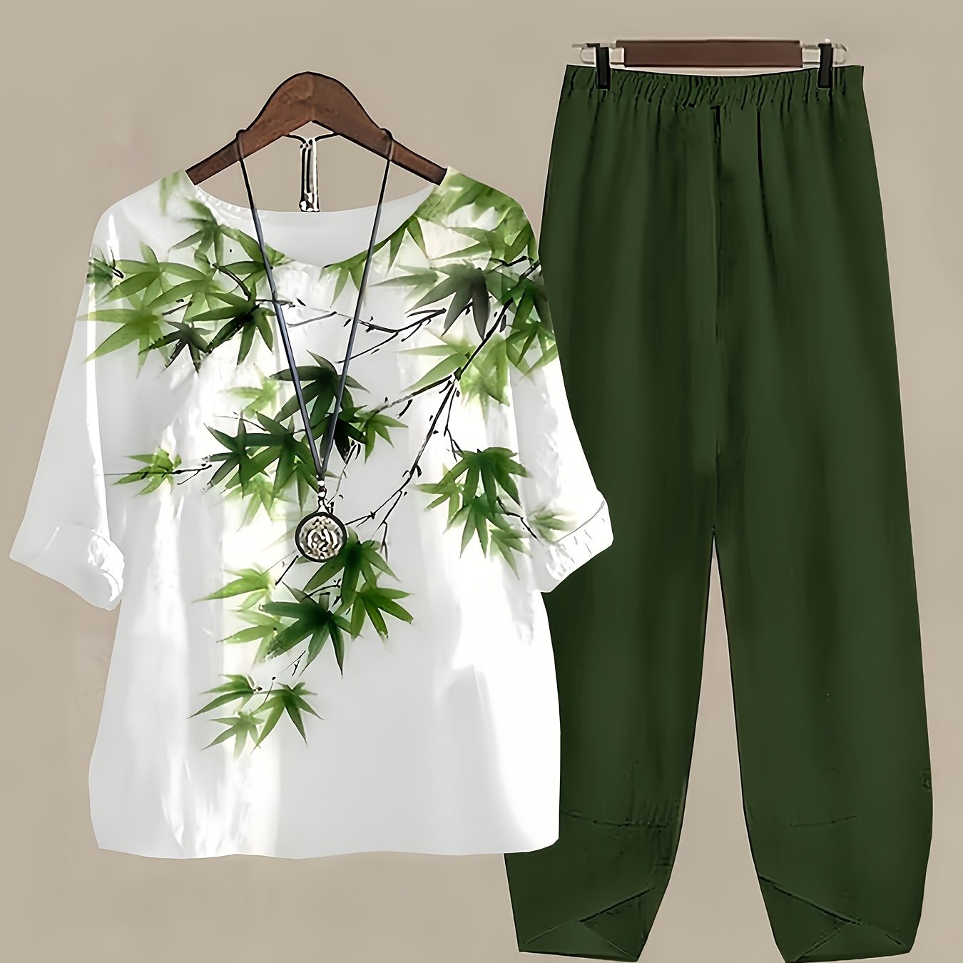 Bamboo print two-piece set: casual short sleeve t-shirt and fitted bottom pants for women.