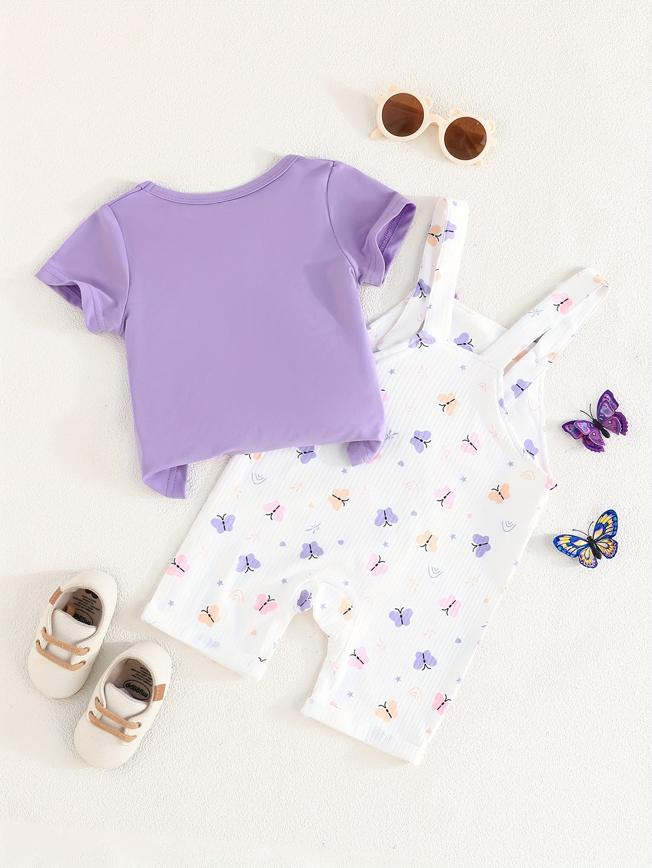 Girls' purple butterfly print romper & t-shirt set, lightweight polyester, summer casual wear, white with purple & pink accents, playful print design, polyester knit, outdoor clothing.