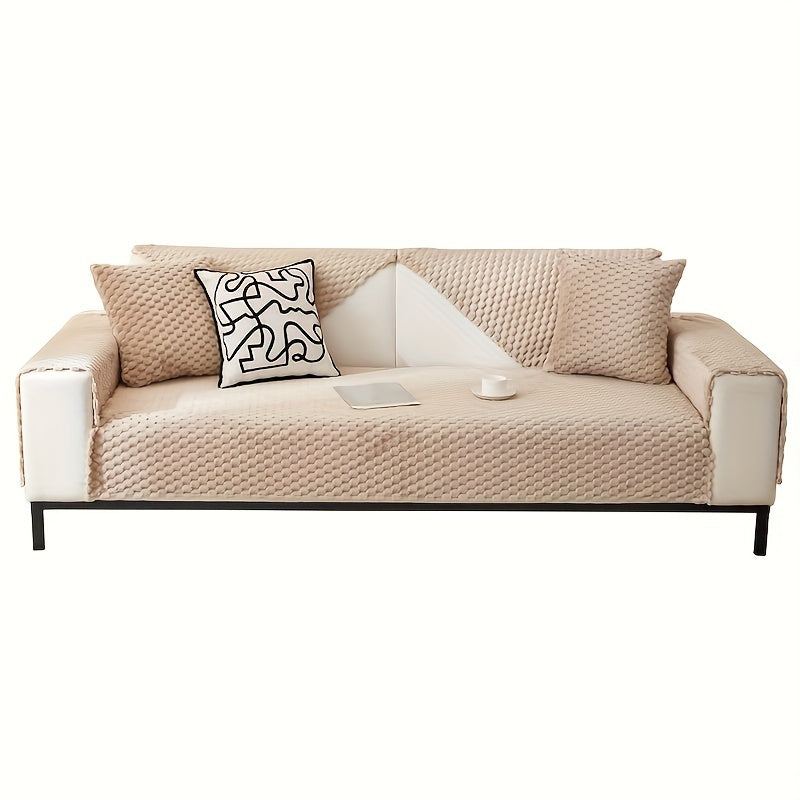 Non-slip sofa cover with honeycomb pattern, ideal for all seasons and protecting furniture in any room.