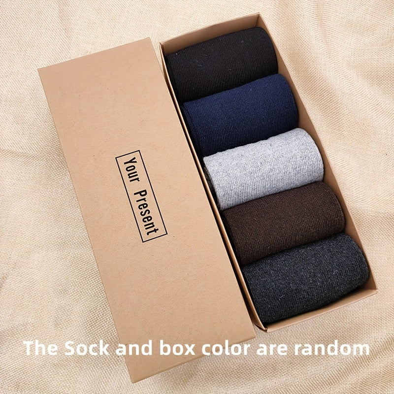 5 pairs of men's warm and comfortable wool socks, boxed for gifting.