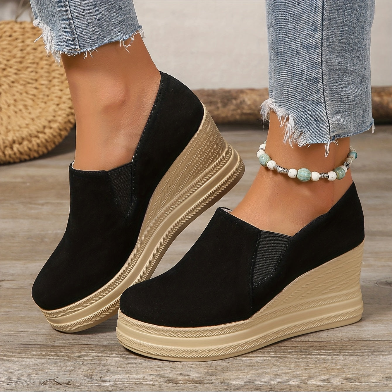 Women's platform wedge sneakers with high heels and slip-on design, featuring faux sole and fabric insole for all-season comfort.