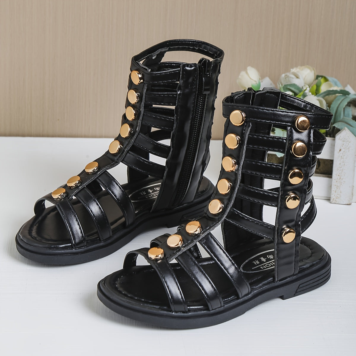 1 Pair of Fashion Rivet Buckle Sandals with Geometric Pattern, Back Zipper, Synthetic Faux Leather Upper and Rubber Sole for Spring/Summer Wear.