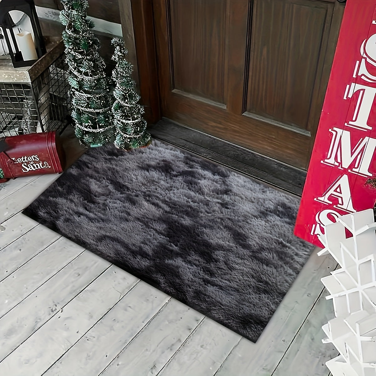 Soft plush area rug in deep grey tie-dye design, perfect for adding a cozy touch to your bedroom or living room. Made of fluffy polyester shaggy material, this carpet is ideal for festive Christmas decor. Rectangular in shape, this rug should be dry