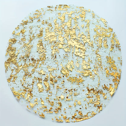 Circular golden foil grid pattern on disposable golden placemat